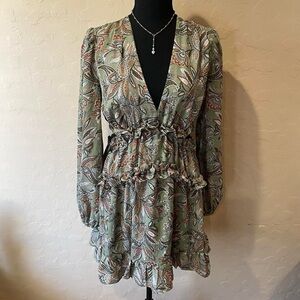 papaya green paisley dress with long sleeves and ruffles